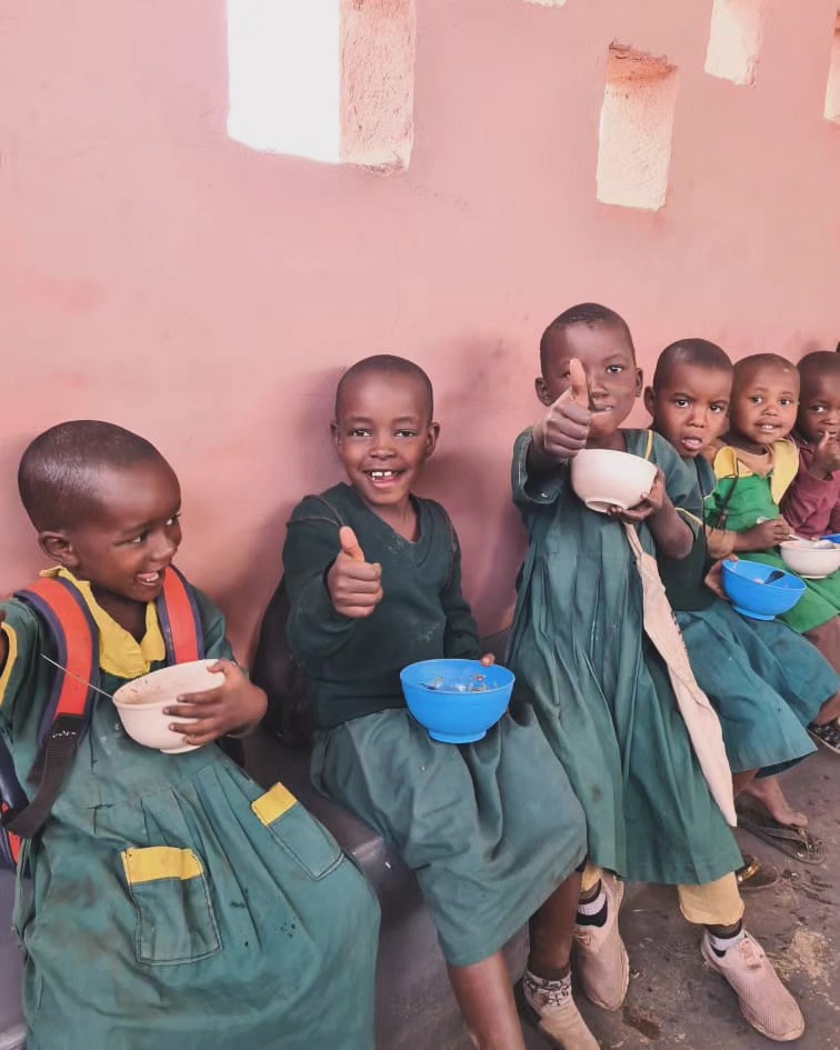 Children enjoying nutritious meals at school in Tanzania